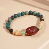 Carved Carnelian, Cuprite in Chrysocolla, Sunstone, Prehnite, and Smoky Quartz - GAEA